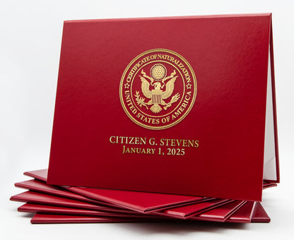 Red Honor U Classic Certificate of Naturalization tent-style document cover on white background.