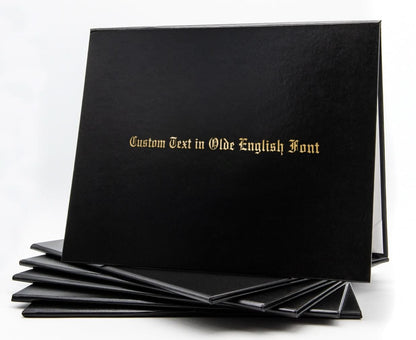 Black custom tent-style document cover with metallic foil printed text, designed by Honor U for professional presentation.