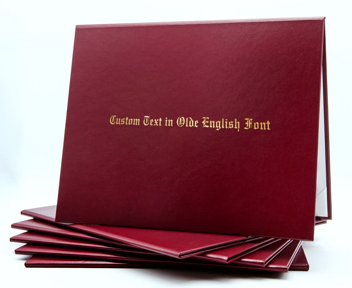 Maroon custom tent-style document cover by Honor U with metallic foil printed text on the front.