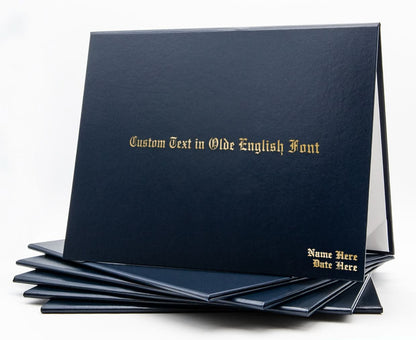 Navy blue custom tent-style document cover by Honor U with metallic foil printed text on the front.