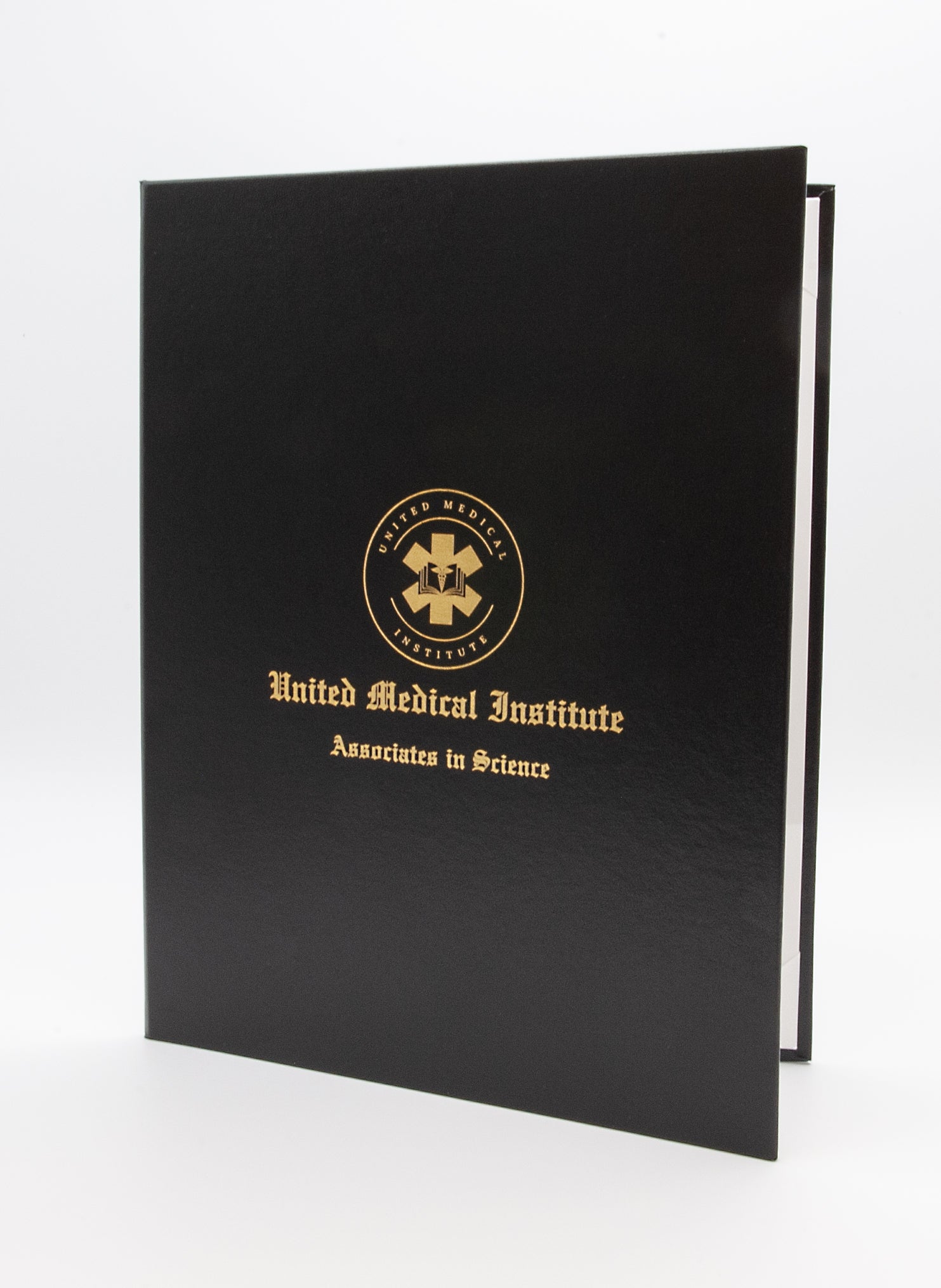 Black binder with metallic gold embossed text and logo on a white background